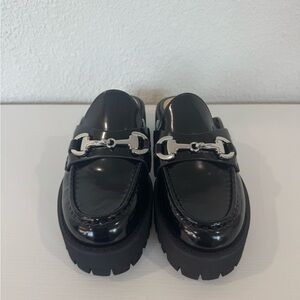 Black Loafers with Silver Detailing